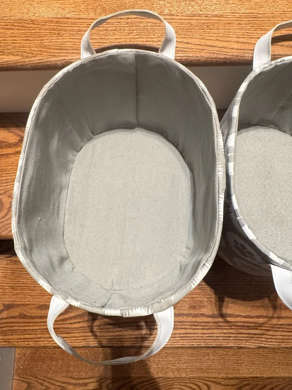 Set of gray & white paw print canvas storage baskets with white leather handles